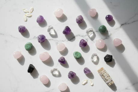 Colourful tumbled healing crystals and sage smudge stick at Clarity of Sight Milton Keynes